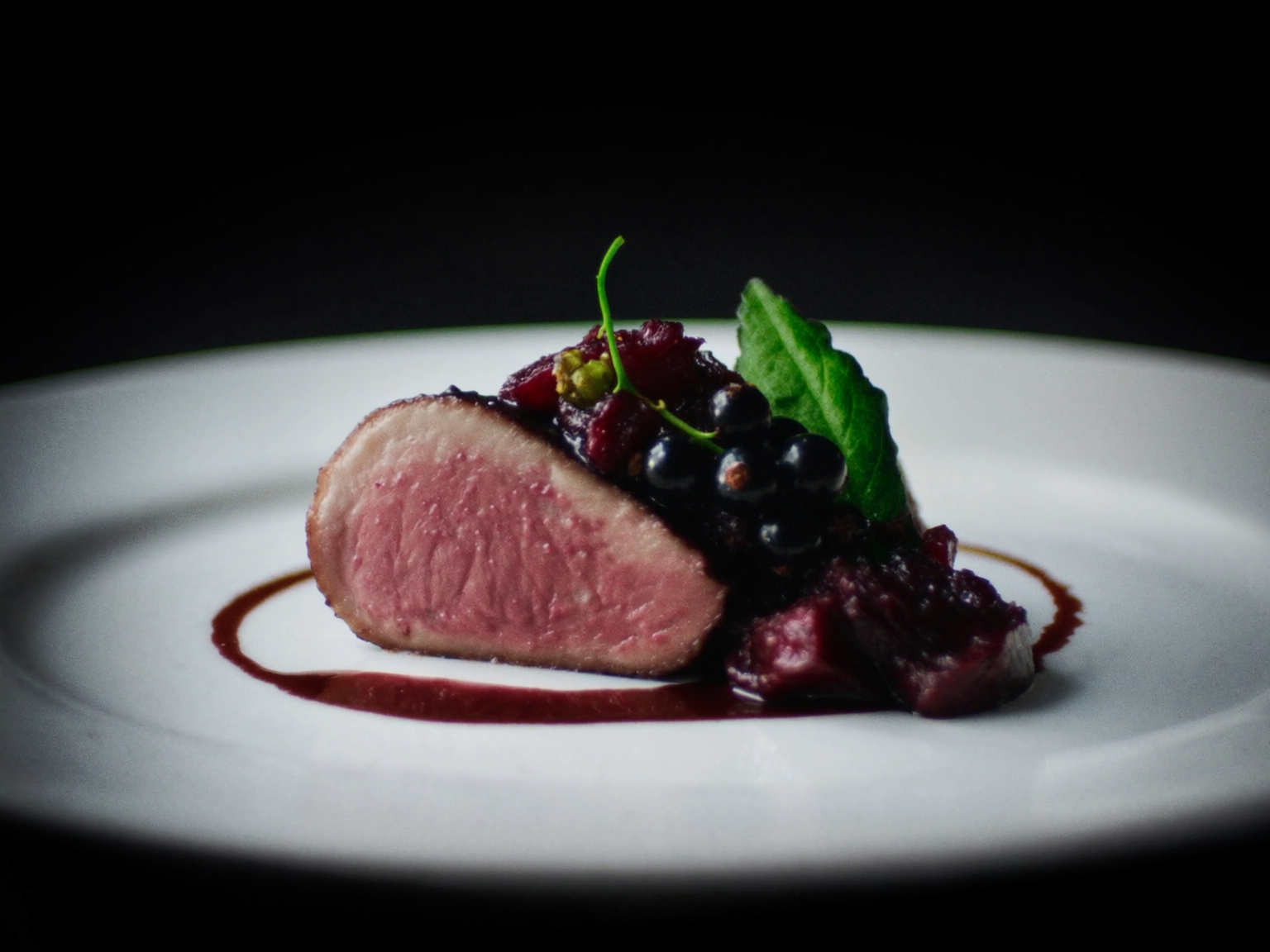 Roasted Racan pigeon breast with beetroot and blackcurrant